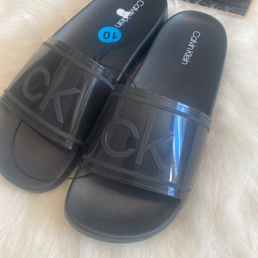 Calvin Klein Women's Austin Translucent Jelly Logo Pool Slides.